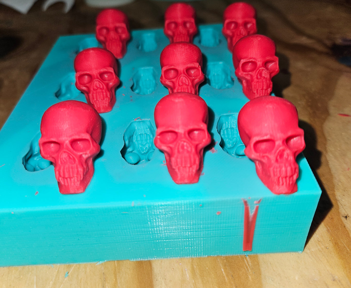 9-Cavity skull silicone mold Get spooky and creative with our Skull Mold! Perfect for chocolate or wax melts. Easy-peasy and fun!